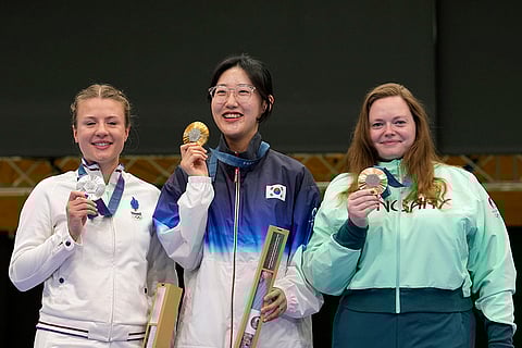 Women's 25m pistol: Gold medalist South Korea's Yang Jiin, center, silver medalist France's Camille Jedrezejewski, left, and bronze medalist Hungary's Veronika Major